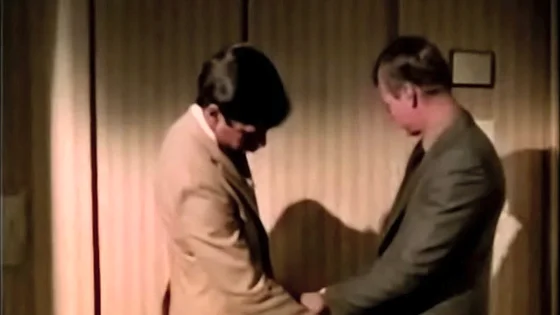 2 bus. men in elevator (vintage comp)