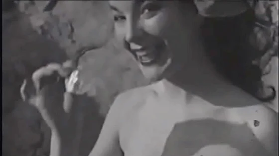 Playful vintage porn model takes part in outdoor shooting exposing her tight round melons