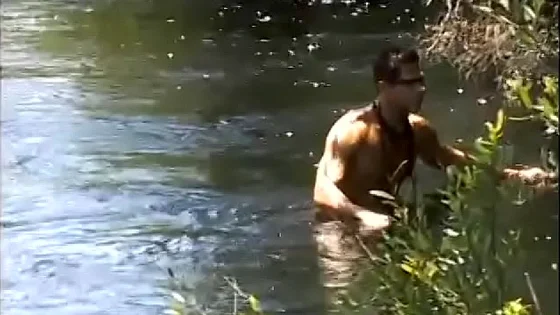 Curious aboriginal inhabitant of rainforest of Amazonian region found on the river bank gay magazine and imagined strange intercourse with pretty white boy with fair hair Felipe Vilhena