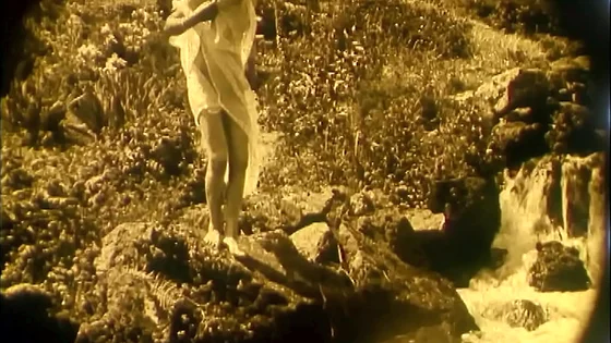 Nude Woman by Waterfall (1920)