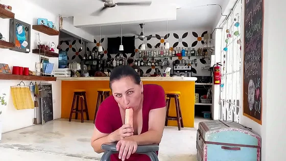 A pretty lady in a red dress sucks and fucks a big dildo. Footjob, titlob, blowjob. 3 1